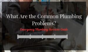 Plumber fixing a kitchen sink with emergency plumbing tools for emergency plumbing services.