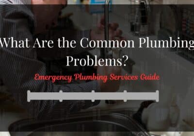 Plumber fixing a kitchen sink with emergency plumbing tools for emergency plumbing services.