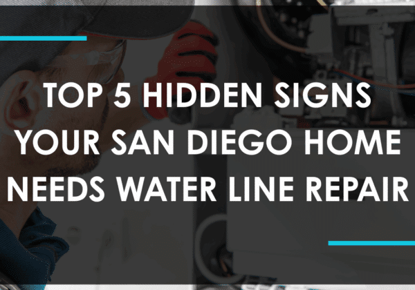 Close-up of a plumber inspecting underground water pipes for water line repair San Diego