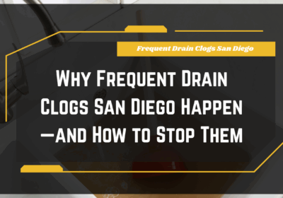 Frequent Drain Clogs San Diego: Close-up of a plumber unclogging a kitchen drain pipe in San Diego.